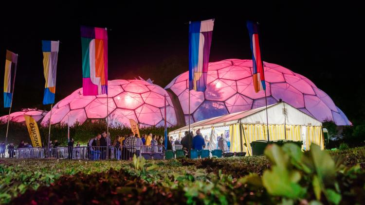 Eden Sessions bar with lit up Biomes in the background