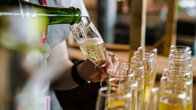 Champagne being poured into glasses