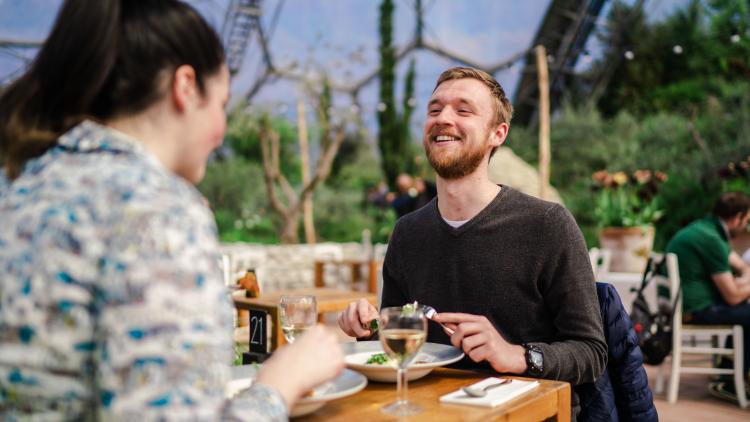 People enjoying dinner in the Med Biome.