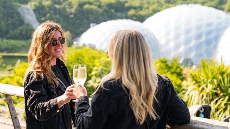Two ladies enjoying prosecco on the Sessions Plus Terrace