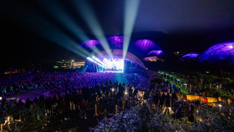 Eden Sessions concert with lights shooting out of the stage