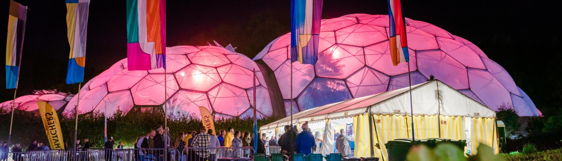 Eden Sessions bar with lit up Biomes in the background