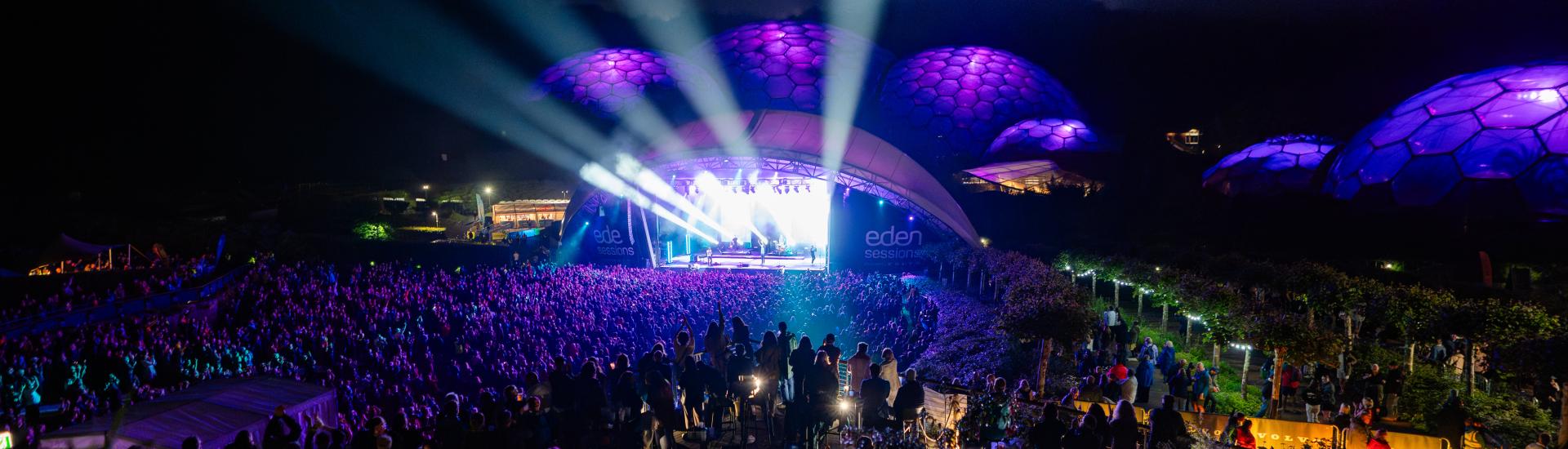 Eden Sessions concert with lights shooting out of the stage